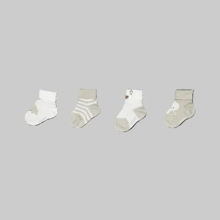 Confezione 4 pezzi calzini beige per neonato - immagine 3